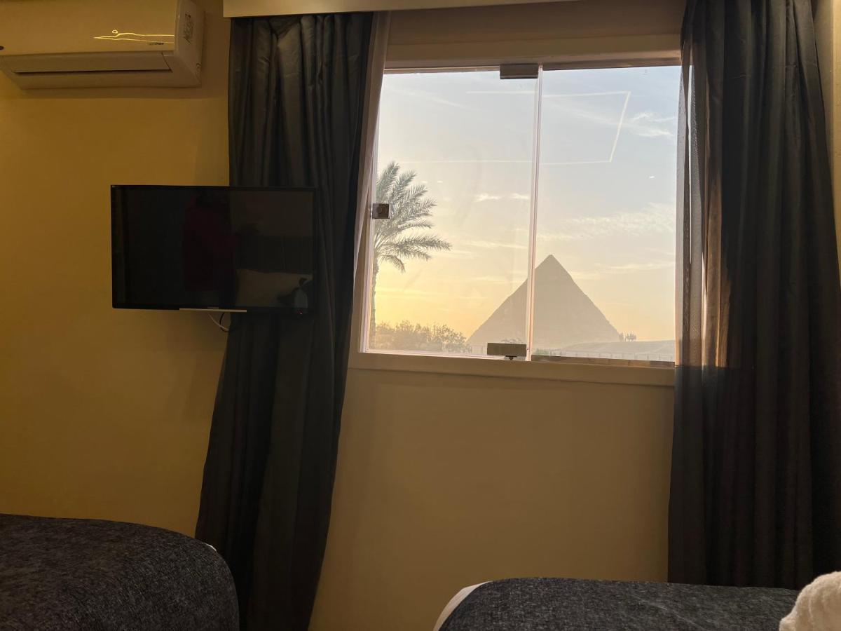 Blue Scarab Pyramids View Hotel Cairo Exterior foto